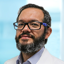 Dr. Alex Junca — Médico