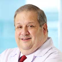 Dr. Carlos A. Velarde — Médico