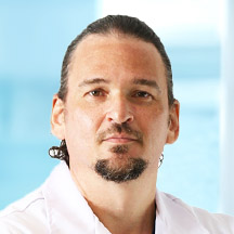 Dr. Juan Carlos Pretto — Médico
