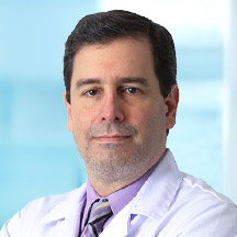 Dr. Juan Erasmo González — Médico