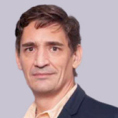 Néstor E. Beloso — Corredor De Bienes Raíces