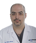 Dr. Mario Garuz — Médico